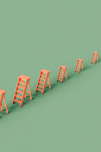 Pink Folding Ladders Crossing A Vertical Frame