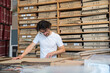 © Hernandez & Sorokina/Stocksy - Man Reading Periodical In Archive
