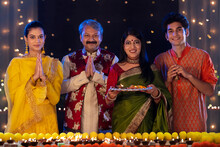 Portrait Of A Indian Family Greeting With Their Joined Hands The Occasion Of Diwali