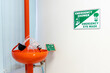 Emergency eyewash stations in the safety of workers with water flowing in laboratory or manufacturing facility.