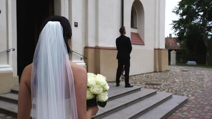 Poster - An HD of a bride walking to the groom in the churchyard