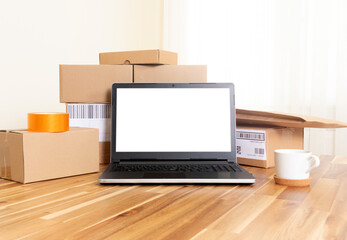 Online shopping boxes and laptop screen mockup. online start up concept.