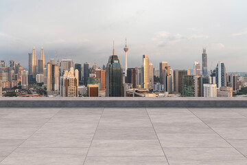 Panoramic Kuala Lumpur skyline view, concrete observatory deck on rooftop, sunset. Asian corporate and residential lifestyle. Financial city downtown, real estate. Product display mockup empty roof