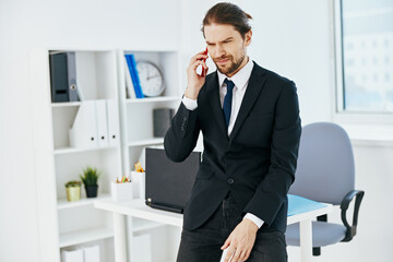 manager holding a phone telephone office lifestyle