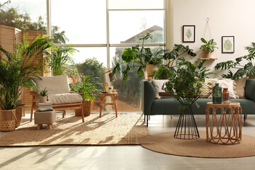 Sticker - Stylish room interior with different houseplants and furniture near window