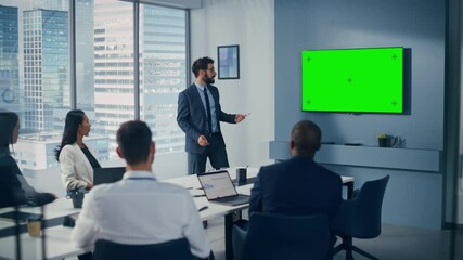 Leinwandbilder - Office Conference Room Meeting Presentation: Motivated Caucasian Businessman Talks, Uses Green Screen Chroma Key Wall TV. Successfully Presenting a Product to Group of Multi-Ethnic Investors