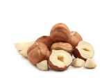 Fototapeta Lawenda - Heap of tasty hazelnuts on white background