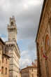 Montepulciano (SI), Italy - August 02, 2021: View of an old stone bell tower, Tuscany, Italy