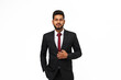 © Тарас Нагирняк - Portrait of young indian top manager in black suit on white isolated background