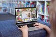 © vectorfusionart - Caucasian girl using laptop for video call, with smiling diverse elementary school pupils on screen