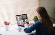 © vectorfusionart - Caucasian girl using laptop for video call, with smiling diverse elementary school pupils on screen