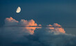 Rising moon with sunset clouds