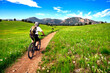 © Jim Glab - Mountain biker rides the Flatirons VIsta Trail near Boulder, Colorado