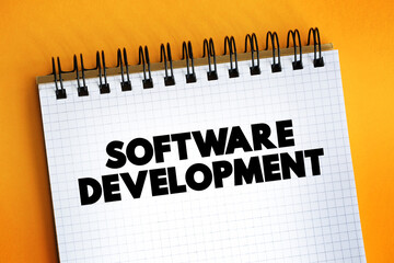 Wall Mural - software development text on notepad, concept background.