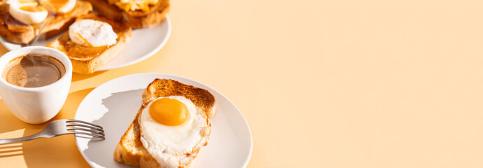 Wall Mural - fried Toast bread with four different types of cooked chicken eggs, scrambled eggs, fried eggs, poached egg and creamed egg. Breakfast of chicken eggs. methods of making eggs for breakfast