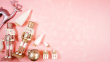 Christmas Pink Theme Holiday Background Framed Border Banner Styled With Reindeers, Nutcrackers And Ornaments On A Textured Pink Backdrop. Creative Composition Blog Hero Header.