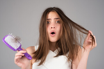 Stressed woman is very upset because of hair loss. Haircut and straightening hair care. Serious hair loss problem for health care shampoo.