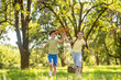 © zinkevych - Boy and girl running with toy airplane