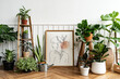 © Rawpixel.com - Picture frame by a houseplant corner on a parquet floor
