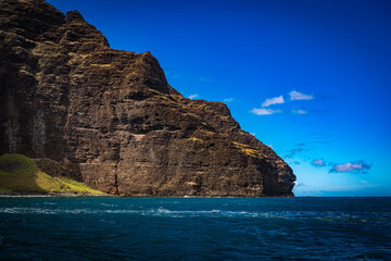 Wall Mural - 2021-10-07 A ROCK CLIFF ON THE NA'PALI COAST WITH BLUE SKYS AND BLUE OCEAN