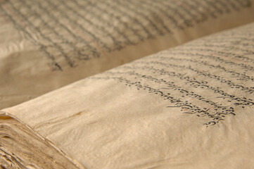 Wall Mural - Ancient open book in arabic. Old arabic manuscripts and texts