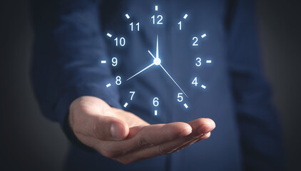 Caucasian businessman showing clock. Time Management