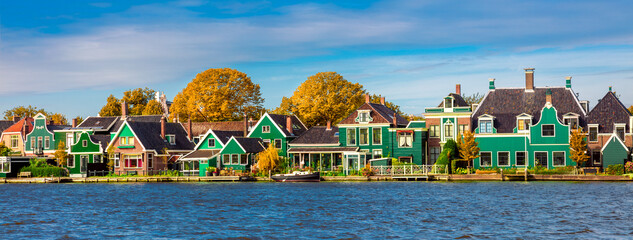 Dutch village Zaanse Schans near Amsterdam. Typical Dutch wooden green houses. Holland, Netherlands