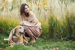 © snedorez - Beautiful girl with two golden retrievers in park