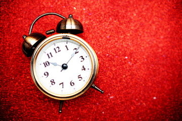 Canvas Print - Top view of Alarm clock with space copy on red bokeh background