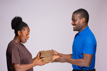 Young African Woman Receiving Money From A Business Agent
