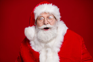 Sticker - Photo of funny impressed retired man wear santa claus costume spectacles open mouth celebrating noel isolated red color background