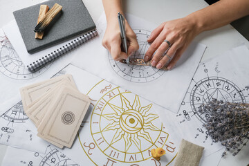 Wall Mural - astrology. astrologer calculates natal chart and makes a forecast of fate.tarot cards, fortune telli