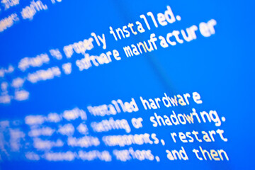 Blue screen of death on computer. Selective focus