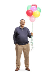 Canvas Print - Full length portrait of a mature man smiling and holding a bunch of colorful balloons