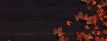 Seasonal Wallpaper, With Fall Leaves On Dark Wood Surface. Thanksgiving Concept With Space For Text.