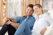 © auremar - close up of young couple on sofa at home