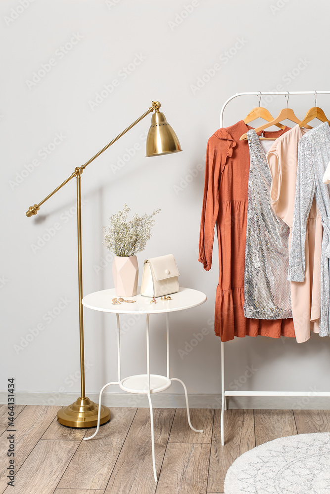 Interior of stylish room with clothes