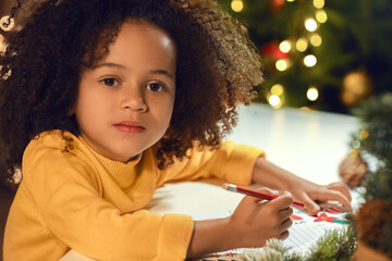 Sticker - Cute African-American girl writing letter to Santa at home