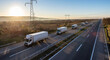 © Bojan - Caravan or convoy of White Lorry trucks in line on a country highway.