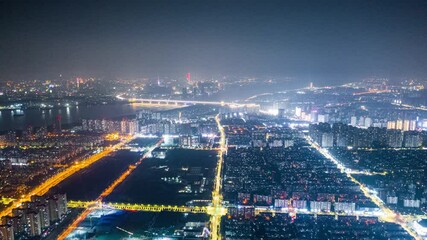 Canvas Print - Aerial top view of city at night，timelapse