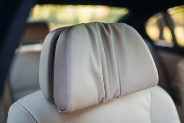 Wall Mural - White comfort leather passenger seat headrest in modern sport car