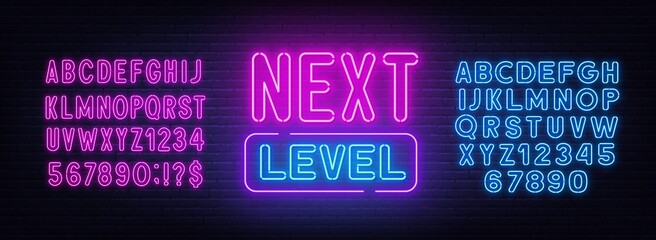 Wall Mural - Next level neon sign on brick wall background.