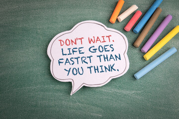 Wall Mural - Dont wait. Life goes faster than you think. Speech bubble on a chalk board