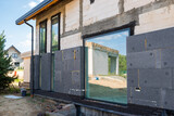 Fototapeta Morze - facade with thermal insulation of a single-family house