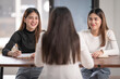 © EduLife Photos - College instructors and advisors meet female college students to advise their research study. Education Concept Stock Photo