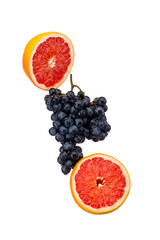 Wall Mural - Dark blue grape with red grapefruit isolated on white background