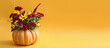 Beautiful autumn bouquet in pumpkin on color background with space for text