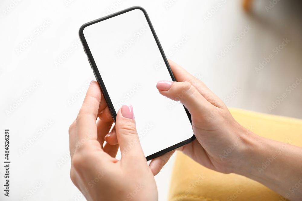 Female hands with mobile phone, closeup