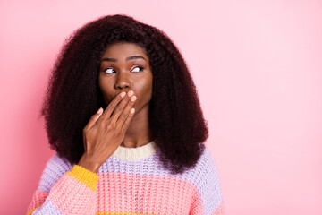 Sticker - Photo of minded dark skin lady hand palm covering mouth lips look empty space isolated on pink color background