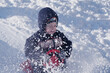 © bravissimos - Boy sledding down on snow hill in winter